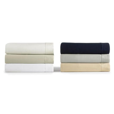 Angelina coverlet stack of colors
